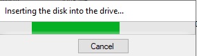 inserting the disk into the drive