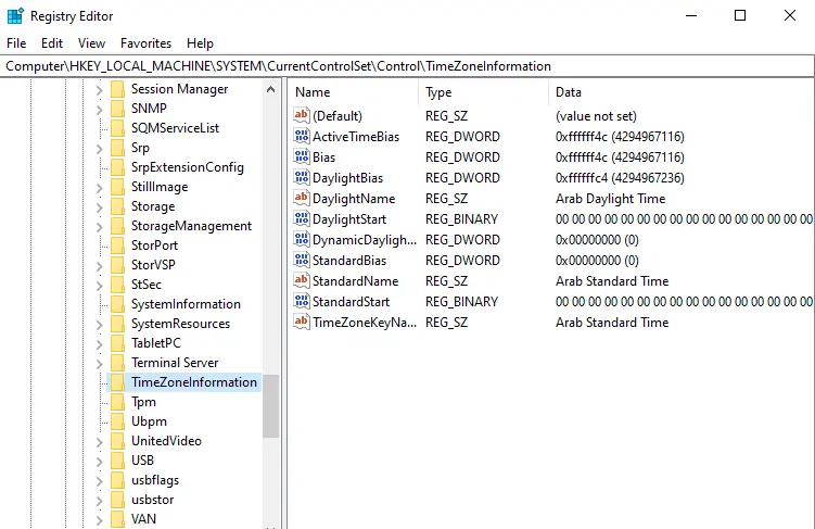 Set up time zone via registry